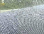Small hail on our roof in Raymond Terrace on Fri 22 Oct 2004 at 1246. Photo by Grant Burgess